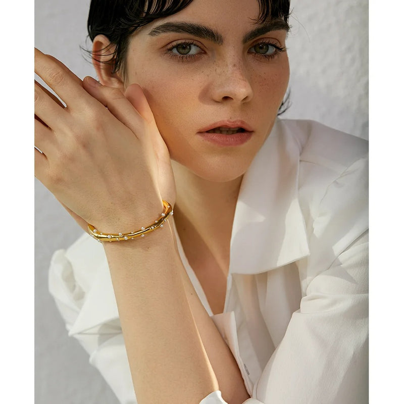 Gold-Toned Stainless Steel Open Cuff Bracelet Adorned with Sophisticated Faux Pearls