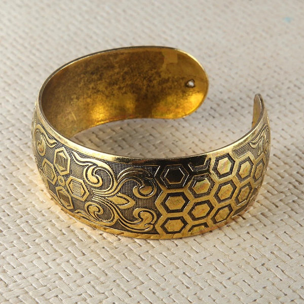 Vintage-inspired Brass Gypsy Bracelet with Floral Elephant Carving